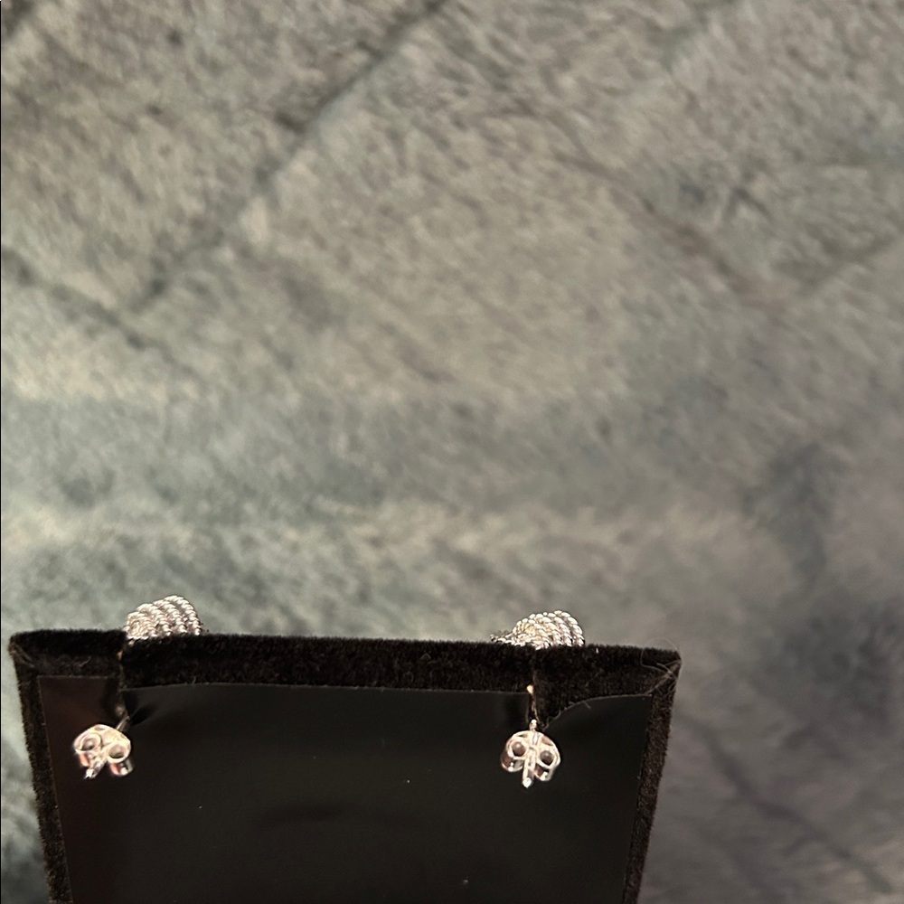 Elegant Sterling Silver Knot Stud Earrings - Picture 3 of 3